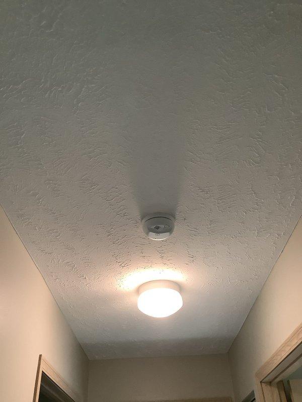 Replaced four hardwired smoke detectors in a commercial property. All units were successfully removed and new detectors installed with proper electrical connections to existing wiring. System tested and verified operational upon completion.
