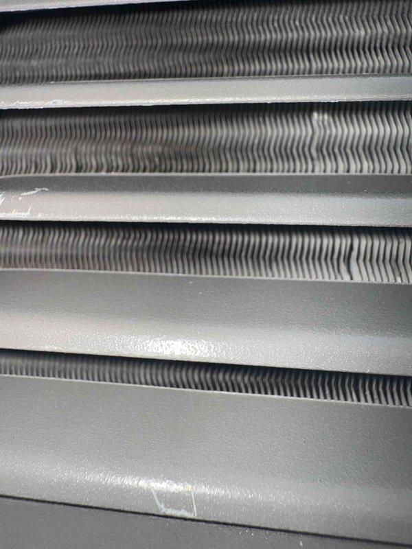 Completed MVP recurring cooling maintenance visit on residential air conditioning system. Performed comprehensive inspection of evaporator coil assembly, which showed excellent condition with clean, well-maintained fins and no signs of dirt buildup, corrosion, or damage. Inspected dual-run capacitor (JARD by Mars, 45+5 MFD, 440/370VAC) with secure wire connections and functional terminal assembly. All components operating within normal parameters with no service issues identified.