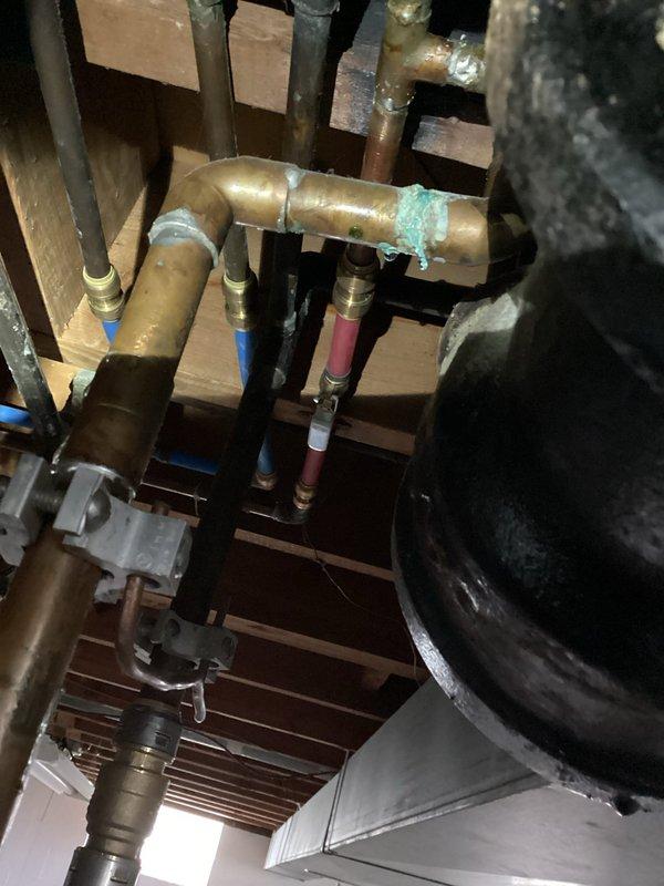 Completed comprehensive MVP AC maintenance on residential HVAC system. Performed thorough inspection of furnace unit, including blower motor assembly, gas line connections, and electrical wiring harnesses. Observed existing copper piping with surface oxidation and patina buildup in mechanical room. Verified proper operation of all system components, checked connections and fittings, and documented equipment condition through photographic records. All components found to be functioning within normal operational parameters.