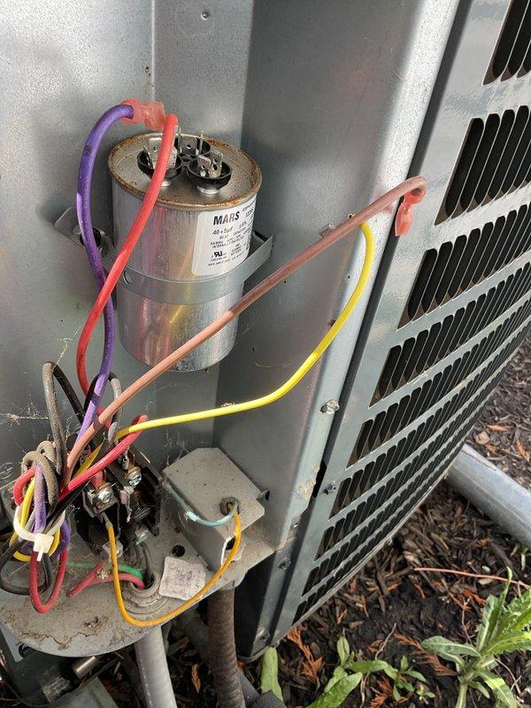 Completed seasonal air conditioning maintenance tune-up on residential outdoor condenser unit. Performed comprehensive system inspection including electrical component evaluation, capacitor testing, condenser coil assessment, and visual equipment examination. Unit operating within normal parameters with all electrical connections secure and components functioning properly.