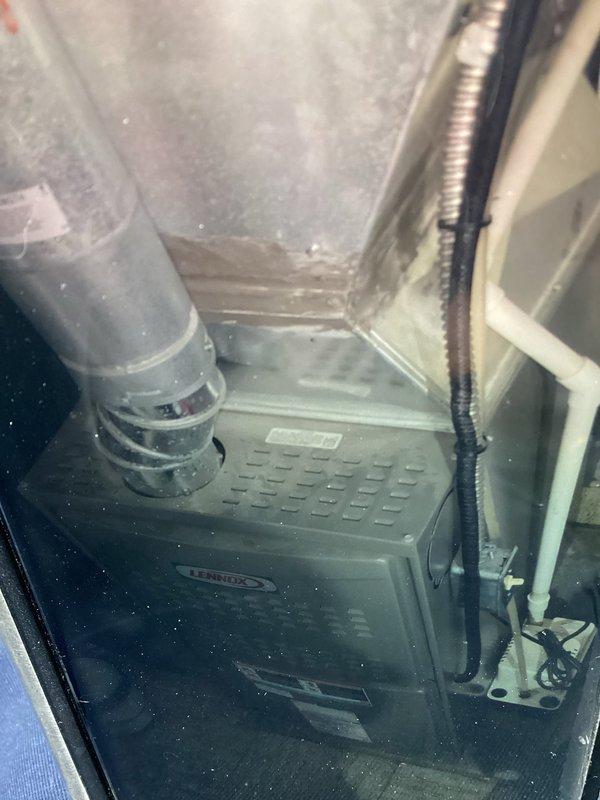 Completed comprehensive tune-up on 7-year-old Lennox air conditioning system and furnace. Performed standard maintenance procedures including inspection of outdoor condensing unit, verification of electrical connections at disconnect box, assessment of refrigerant levels, and examination of indoor furnace unit with connected ductwork. All components found operating within normal parameters, system cleaned and tested for optimal performance.