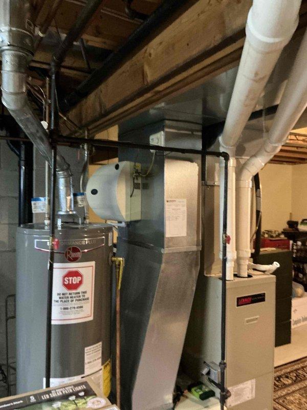 Provided comprehensive estimate for complete HVAC system replacement in residential basement installation. Existing gas furnace exceeded 25-year service life and required replacement due to age and efficiency concerns. Evaluated current equipment configuration including furnace unit, water heater placement, and existing ductwork connections. Assessed basement mechanical room layout, ceiling clearances with exposed joists, concrete floor conditions, and available space for new equipment installation. Documented existing system specifications, duct connections, and utility routing including gas lines, electrical service, and condensate drainage requirements for proper replacement planning and equipment sizing recommendations.