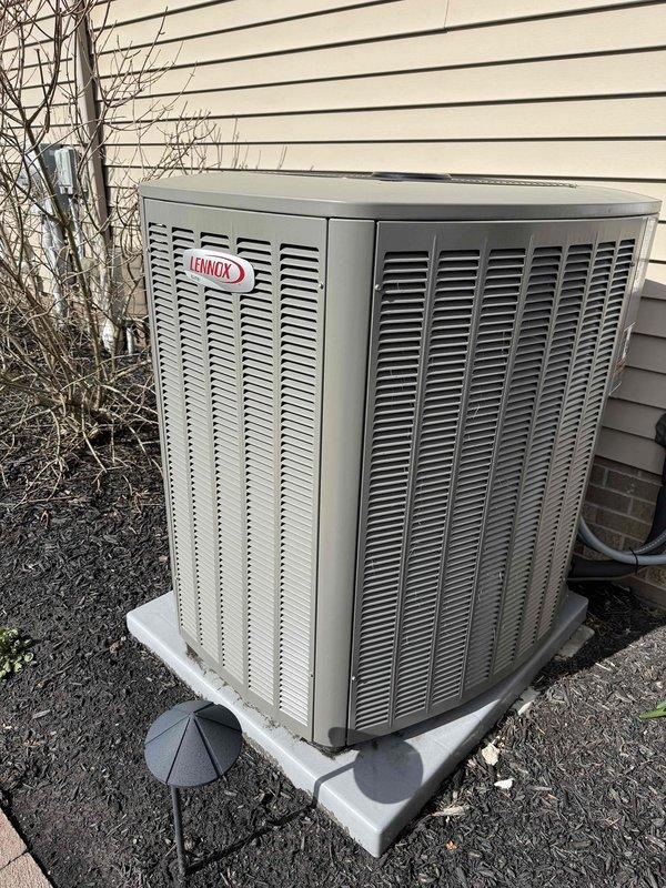 Completed MVP cooling visit and preventive maintenance inspection on Lennox air conditioning system. Inspected and photographed blower wheel assembly, confirming clean operation of squirrel cage fan with no debris accumulation. Examined outdoor condenser unit positioned on concrete pad, verified proper clearance and unit condition. Applied sealant to exterior component as previously discussed with customer to address weatherproofing concern.