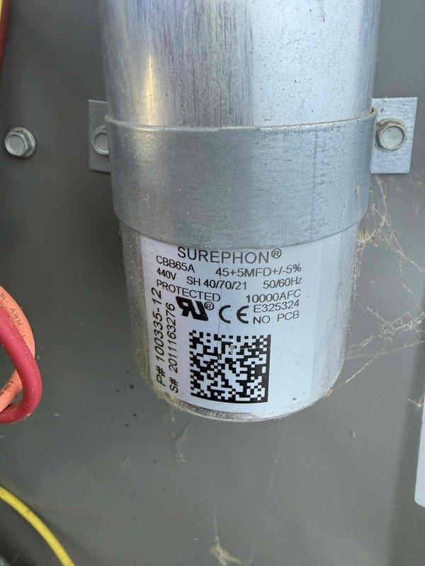 Completed routine MVP cooling maintenance on 4-year-old system. Inspected control board including DIP switch settings and outdoor discharge air sensor connections, verifying all electronic components functioning properly. Examined dual run capacitor rated at 45+5 MFD, confirmed proper ratings and secure mounting. All components operating within normal parameters with no deficiencies noted.