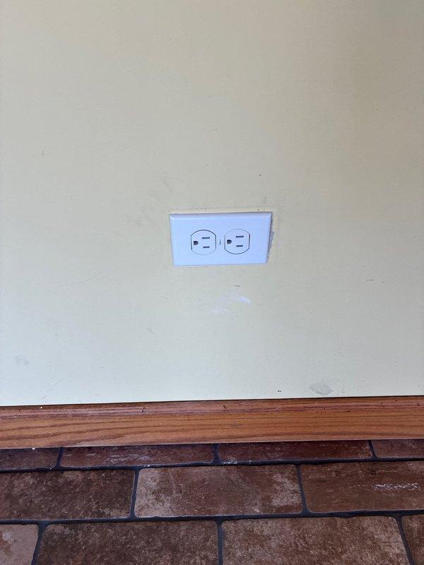 Replaced electrical junction box and rewired receptacle connections in sunroom to ensure proper operation and code compliance. Assessed kitchen lighting circuit configuration, removed two existing light fixtures, and installed single centered fixture in kitchen with proper junction boxes created in attic space for discontinued fixture locations.
