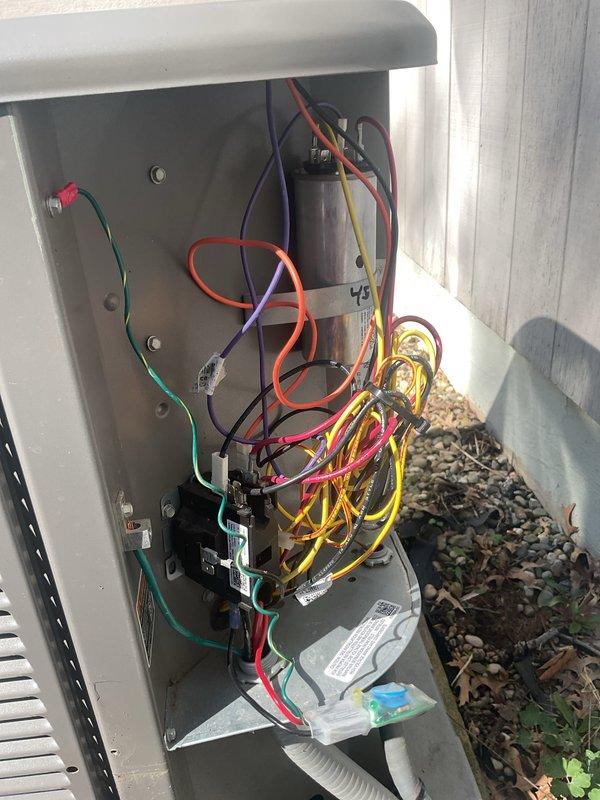 Completed MVP cooling maintenance visit on residential HVAC system. Performed comprehensive inspection of outdoor condensing unit and electrical control panel, documenting equipment condition with photos showing internal wiring connections, contactors, capacitor, and overall system components. All electrical connections verified, unit operational, and system ready for continued cooling season performance.
