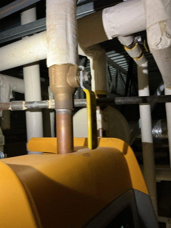 Provided quote for tanked water heater replacement in garage storage area. Assessed existing water heater installation including supply piping, connections, and access requirements. Documented current equipment configuration and surrounding workspace for replacement planning.