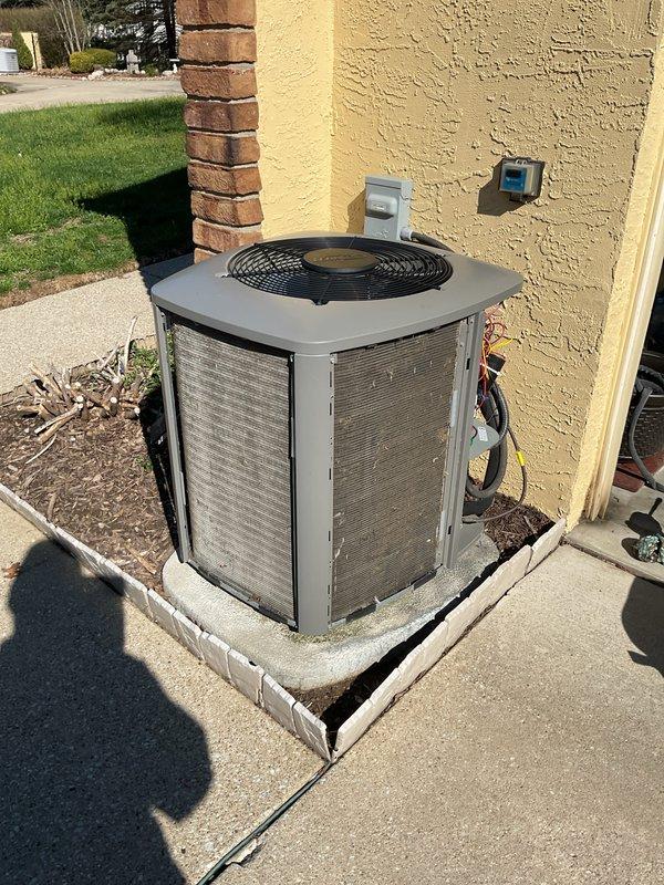Completed annual preventative maintenance on a three-year-old residential air conditioning system. Performed comprehensive inspection of outdoor condensing unit, including cleaning of condenser coils, checking refrigerant levels and pressures, testing electrical connections and capacitors, verifying proper fan motor operation, and ensuring adequate airflow through the unit. System found to be operating within manufacturer specifications with no immediate repairs required.