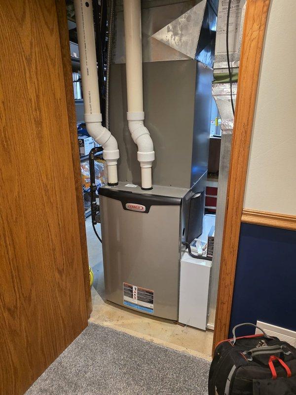 Completed routine maintenance on 7-year-old residential air conditioning system during scheduled early morning service window. Performed comprehensive inspection of ductwork throughout basement utility area, evaluating system for potential cleaning needs and identifying accessible duct runs connected to furnace unit. All visible ductwork, including metallic supply ducts and flexible return air ducting, was assessed for debris accumulation, proper connections, and overall condition to determine cleaning recommendations.