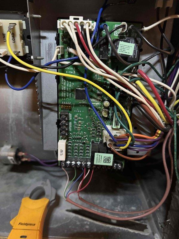 Completed scheduled MVP heating maintenance visit on natural gas heating system. Performed combustion analysis using gas analyzer, recording readings of 12.5% oxygen, 18 ppm carbon monoxide, 83.0% efficiency, and 4.7% carbon dioxide, all within acceptable operating parameters. Inspected and documented control board assembly and electrical connections within equipment cabinet, verifying proper wiring configurations and component operation. System operating normally with no issues identified.