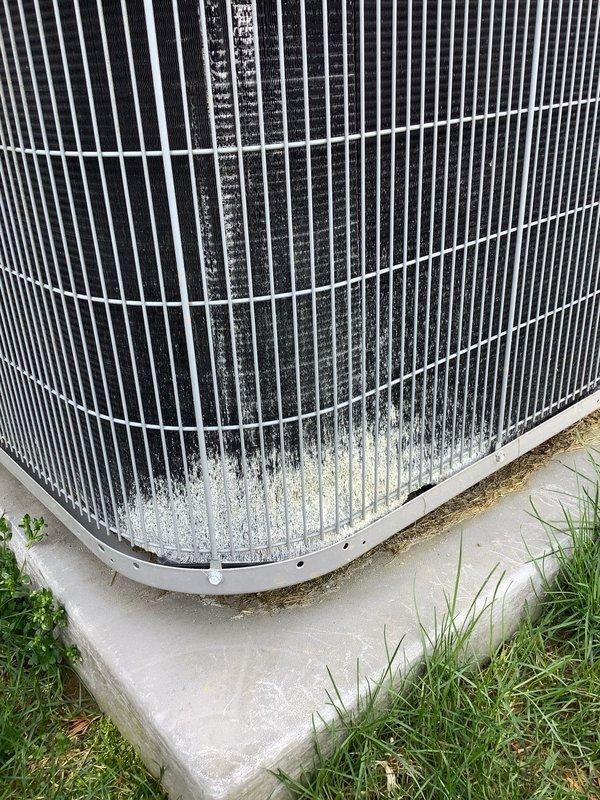 Completed comprehensive tune-up service on both furnace and air conditioning systems that were previously installed by our company. During inspection of the outdoor AC condenser unit, identified significant frost accumulation on lower fins and base, indicating potential refrigerant flow issues or restricted airflow that will require follow-up diagnostics. Performed standard maintenance procedures on both units including filter inspection, electrical connection verification, and visual equipment assessment to ensure continued system operation.