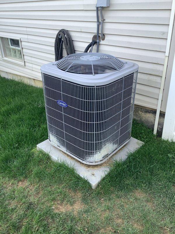 Completed comprehensive tune-up service on both furnace and air conditioning systems that were previously installed by our company. During inspection of the outdoor AC condenser unit, identified significant frost accumulation on lower fins and base, indicating potential refrigerant flow issues or restricted airflow that will require follow-up diagnostics. Performed standard maintenance procedures on both units including filter inspection, electrical connection verification, and visual equipment assessment to ensure continued system operation.