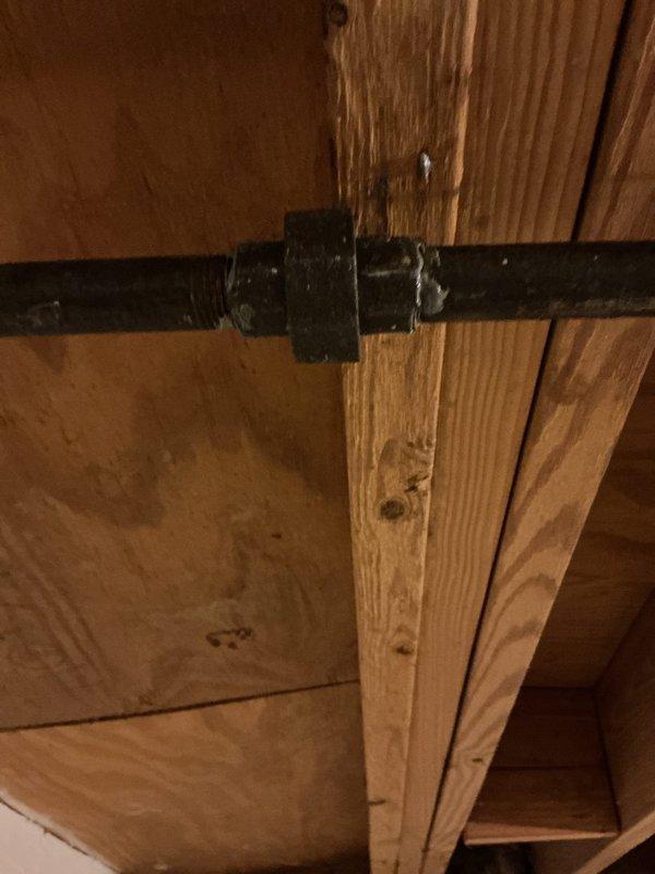 Responded to service call to repair two leaks in water supply lines servicing a fireplace. Located and accessed the affected piping in the attic/ceiling space where galvanized and copper supply lines run through the wooden framing. Successfully repaired both leaks using truck stock materials, securing pipes with appropriate clamps and brackets to the structural framing members. Tested the system to confirm all leaks were eliminated and proper water flow was restored to the fireplace supply lines.