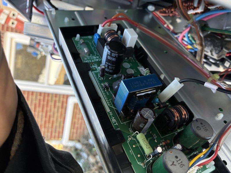 Replaced defective control boards in HVAC system. Initial service required ordering and installing primary circuit board, followed by a second appointment to install an additional board after determining the correct replacement part was needed. Both green PCB assemblies with integrated circuits, capacitors, and digital display components were successfully installed and system restored to proper operation.