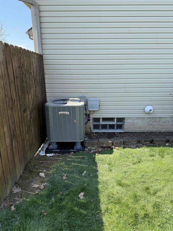 # HVAC Install - Complete System

Completed installation of a 90% efficiency furnace and air conditioning system at residential property. Installed new Lennox outdoor condensing unit on pad adjacent to building exterior with proper electrical disconnect. Performed system evacuation and vacuum test using digital micron gauge, achieving proper vacuum levels for refrigerant charging. Verified all refrigerant line connections, electrical wiring to outdoor unit, and proper system operation. Unit positioned on foundation with appropriate clearances from structure and adequate airflow access. All components tested and operational upon completion.