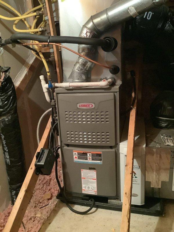 Completed MVP cooling maintenance visit on residential HVAC system. Performed comprehensive inspection of outdoor heat pump unit and indoor Lennox furnace, examining electrical connections, capacitor, contactor, and refrigerant line connections at both locations. Documented equipment condition through photographic records showing all major components operating within normal parameters.