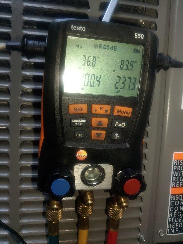 Diagnosed system with abnormal refrigerant pressures using digital manifold gauges to measure R454B refrigerant levels. Recovered refrigerant from system to verify if pressures would equalize and identify potential restriction or compressor issue. Installed filter rack to allow for proper routine filter maintenance and improved system accessibility.