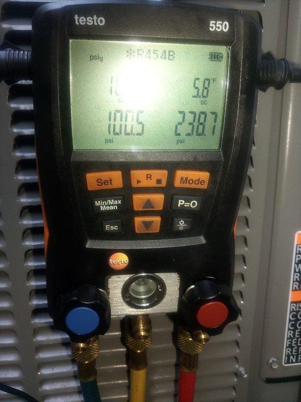 Diagnosed system with abnormal refrigerant pressures using digital manifold gauges to measure R454B refrigerant levels. Recovered refrigerant from system to verify if pressures would equalize and identify potential restriction or compressor issue. Installed filter rack to allow for proper routine filter maintenance and improved system accessibility.