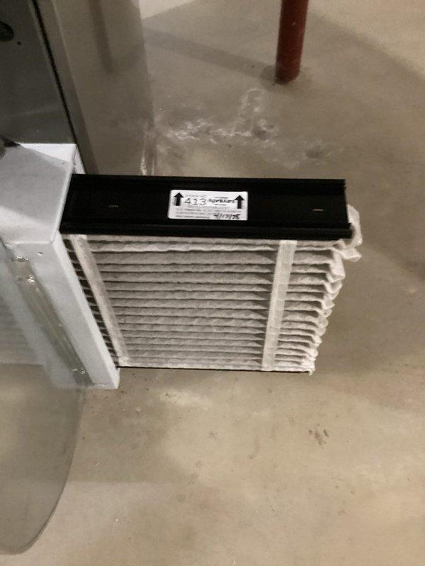 Completed routine maintenance tune-up on both three-year-old furnace and air conditioning systems. Inspected indoor air handler and return air filter assembly in basement utility area, noting dust accumulation on filter grille requiring attention. Serviced outdoor condensing unit, examining condenser coils, refrigerant lines, and electrical connections; unit operating within normal parameters with typical weathering for age and outdoor exposure.