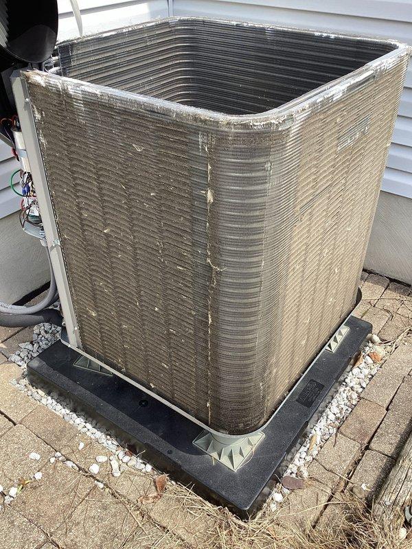 Completed routine maintenance tune-up on both three-year-old furnace and air conditioning systems. Inspected indoor air handler and return air filter assembly in basement utility area, noting dust accumulation on filter grille requiring attention. Serviced outdoor condensing unit, examining condenser coils, refrigerant lines, and electrical connections; unit operating within normal parameters with typical weathering for age and outdoor exposure.