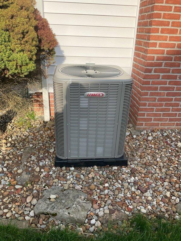 Completed MVP recurring cooling maintenance visit on Lennox outdoor condensing unit. Upon arrival, found condenser coil heavily contaminated with dirt, dust, and debris accumulation affecting approximately half of the coil surface. Performed thorough coil cleaning to restore proper airflow and heat transfer efficiency. Unit now operating within normal parameters with improved coil condition and adequate drainage on gravel pad.