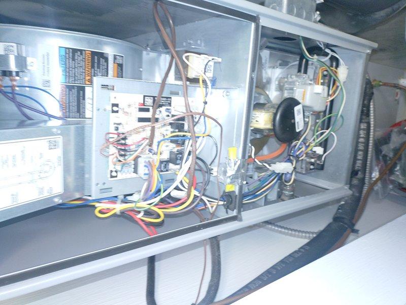 Completed early morning preventative maintenance tune-up on 7-year-old residential air conditioning system. Performed comprehensive inspection of outdoor condensing unit and indoor electrical control components, verified all electrical connections secure within control panel, checked contactor operation and relay function, and confirmed proper system startup. Unit operating within normal parameters with no deficiencies noted at time of service.