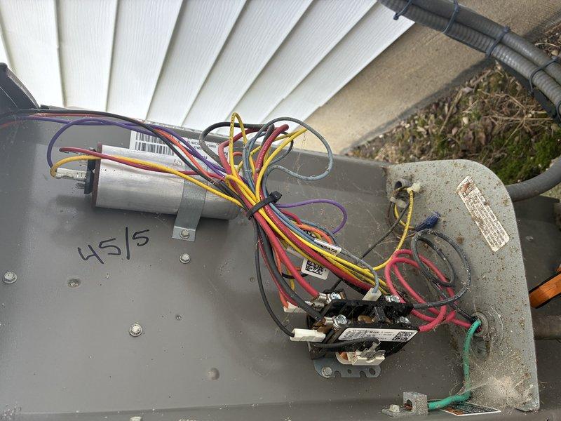 Completed scheduled AC tune-up on Lennox condenser unit. Performed comprehensive system inspection including electrical connections, capacitor testing (readings documented as 4/5/5 on housing), contactor operation verification, and refrigerant line assessment. All components found operating within normal parameters with no deficiencies noted.