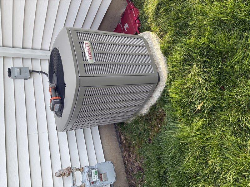 Completed scheduled AC tune-up on Lennox condenser unit. Performed comprehensive system inspection including electrical connections, capacitor testing (readings documented as 4/5/5 on housing), contactor operation verification, and refrigerant line assessment. All components found operating within normal parameters with no deficiencies noted.