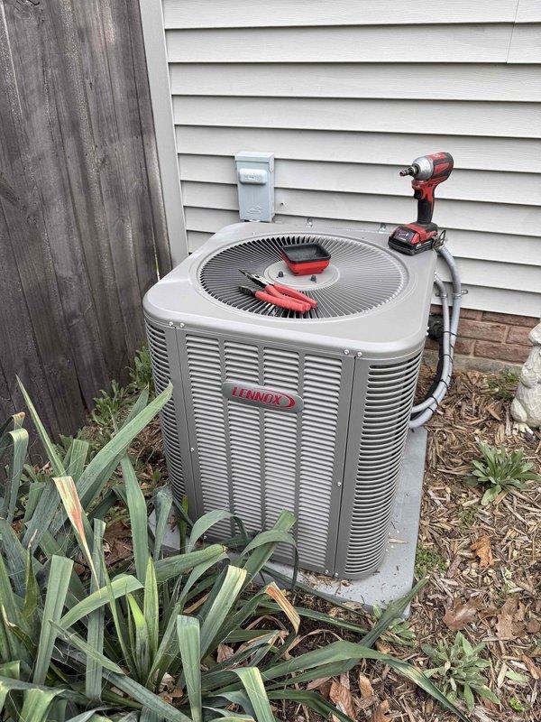 Performed chemical coil cleaning on Lennox outdoor condensing unit. Applied specialized coil cleaning solution to remove dirt, debris, and buildup from condenser coil fins to restore proper heat transfer efficiency and airflow. Unit operational and cooling properly upon completion.