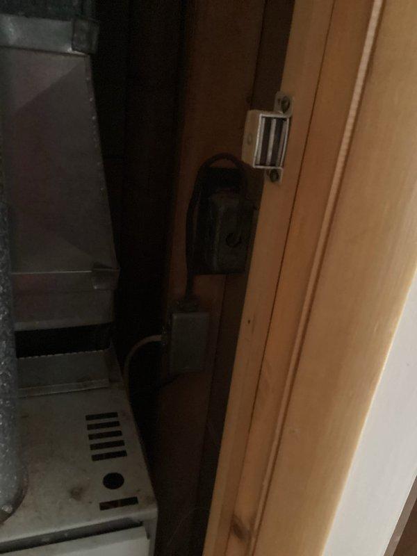 Conducted comprehensive electrical assessment for whole-house rewiring estimate. Inspected existing electrical panel containing dual columns of circuit breakers with main service conductors and distribution bus bars, noting current wiring configuration and capacity. Evaluated utility room mechanical space and HVAC equipment area to determine scope of rewiring requirements throughout the residence. Documented existing electrical infrastructure with photographs and provided detailed estimate for complete residential rewiring project.