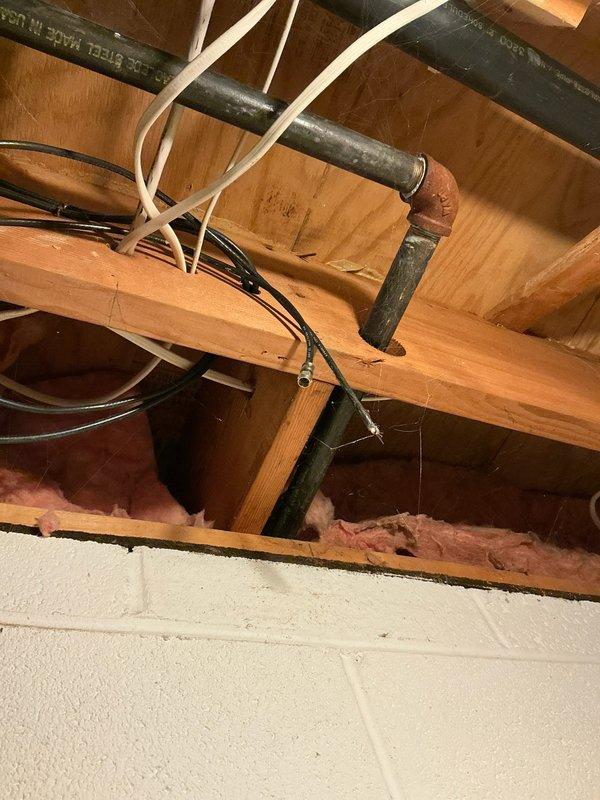 Conducted electrical estimate for whole-house generator installation. Assessed existing electrical panel capacity and configuration, documented current Cutler-Hammer distribution panel with main breaker and circuit layout. Evaluated attic space for potential transfer switch and generator feed wire routing, noting existing utility lines, conduit paths, and structural considerations. Photographed electrical infrastructure and proposed installation areas to provide comprehensive documentation for generator system design and material requirements.