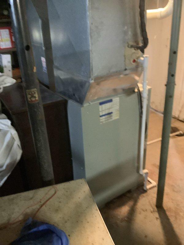 Completed installation of a 90% efficiency American Standard furnace and air conditioning system in basement mechanical room. Installed new air handler with proper ductwork connections, PVC venting for condensate drainage, refrigerant line set, and all necessary electrical connections. System tested and verified operational upon completion.