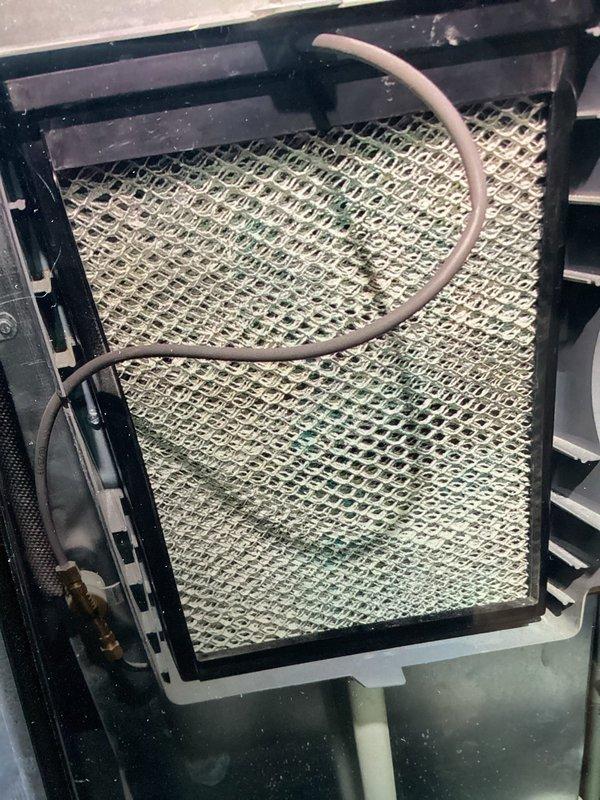 Completed MVP maintenance on 7-year-old air conditioning system. Inspected evaporator coil and found it operational with normal fin condition. Replaced heavily soiled air filter that showed significant dust and debris accumulation, which was restricting airflow and reducing system efficiency. All components inspected and system returned to proper operating condition.