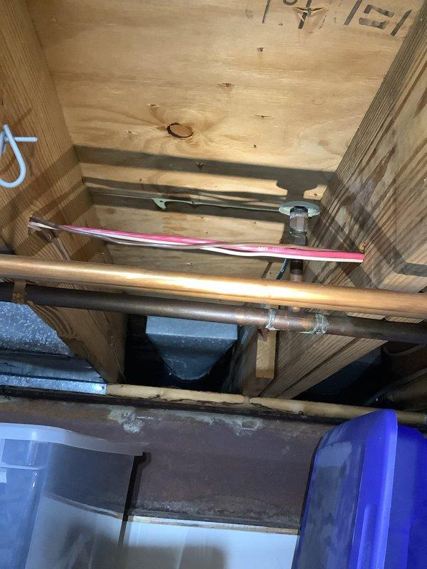 Responded to service call for leaking refrigerator water line. Accessed supply line through ceiling space and assessed condition of existing copper water line connection to refrigerator. Provided quote for replacement of damaged water line, including materials and labor to install new supply line with proper fittings and shutoff valve to eliminate active leak.