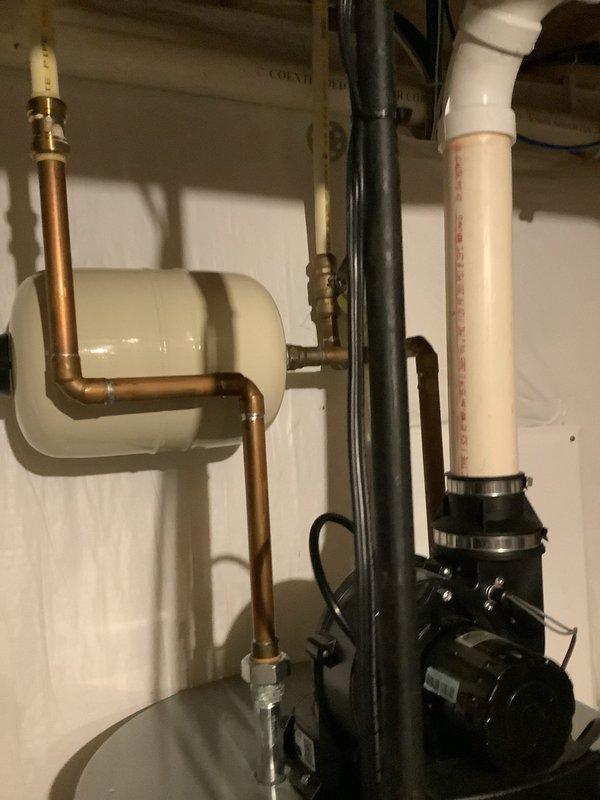Performed routine maintenance flush on residential Crown Group tanked water heater to remove sediment buildup and ensure optimal performance. Confirmed all plumbing connections, including copper supply lines and circulation pump system, were functioning properly with no visible leaks or deterioration. Unit inspected and verified to be in normal operating condition with proper venting and standard residential installation intact.