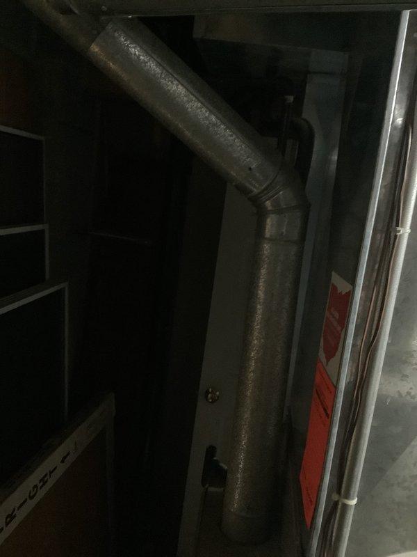 Conducted on-site estimate for replacement of 32-year-old furnace system. Inspected existing HVAC equipment in basement mechanical room, documenting current configuration including refrigerant line routing with black foam insulation, brass fittings, and existing furnace unit with ventilation louvers. Assessed ductwork, piping connections, electrical service, and overall installation accessibility to provide accurate replacement recommendations and specifications for new heating system.