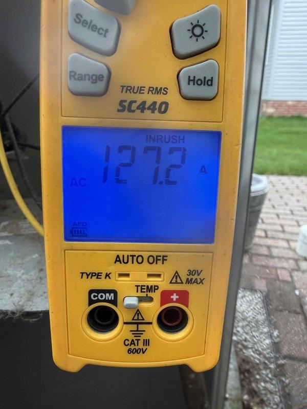 Completed MVP air conditioning maintenance service. Performed comprehensive system inspection and testing, including electrical measurements with multimeter showing 12.72A inrush current reading. Inspected and verified proper operation of contactor assembly and electrical control panel components, confirming 45/14 μF capacitor at 440V specifications with all wire connections secure and functioning within normal parameters.