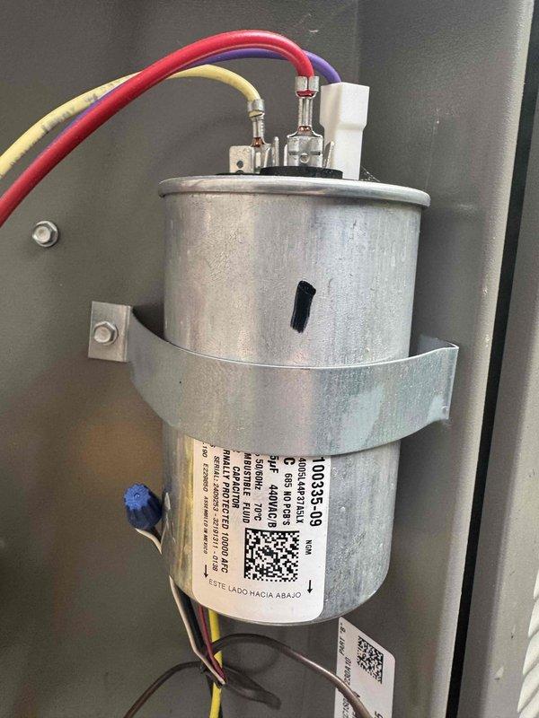 Completed comprehensive AC maintenance service including system inspection and necessary repairs. Performed cleaning of blower wheel assembly which showed significant dust accumulation on the squirrel cage fan blades, and inspected dual-run capacitor with proper wire connections verified. All components tested and system returned to optimal operating condition.