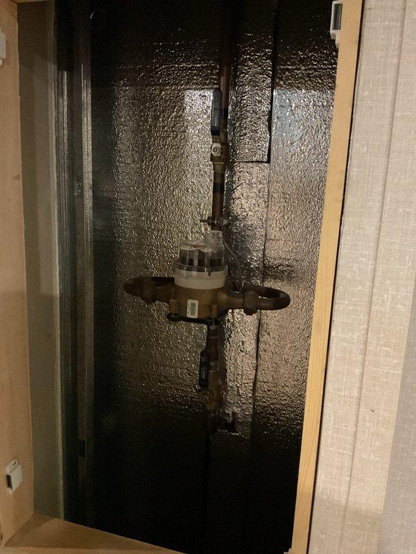 Responded to service call for 7-year-old tanked water heater with pilot light ignition failure located in basement. Upon arrival, performed diagnostic inspection of gas control valve, thermocouple, and pilot assembly. Found thermocouple had failed, preventing proper flame detection and causing pilot safety lockout. Replaced faulty thermocouple with OEM-spec component, cleaned pilot orifice of accumulated debris, and verified proper gas flow to pilot assembly. Re-lit pilot light, confirmed stable flame with adequate blue color and proper flame envelope around thermocouple tip. Tested main burner ignition sequence and verified normal operation through complete heating cycle. Inspected water heater for additional issues, noting minor corrosion at base and age-related wear consistent with unit's service life. All safety controls functioning properly upon completion. Unit restored to full operational status.