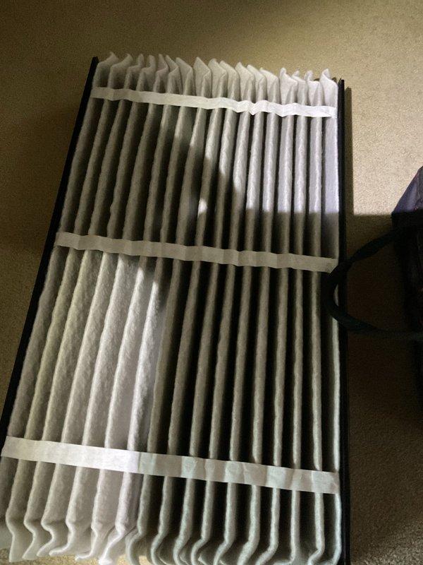 Completed comprehensive MVP air conditioning maintenance service on outdoor condensing unit. Performed standard cooling season preventive maintenance procedures including system inspection and air filter replacement. Replaced dirty pleated air filter with clean filter to ensure proper airflow and system efficiency.