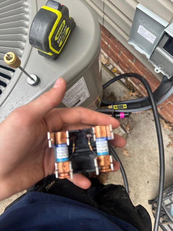 Completed full HVAC system installation including 90% efficiency furnace, air conditioning unit, and whole-home humidifier. Installed new dual-pole contactor with proper electrical connections and verified all copper terminals were secure. Mounted and wired humidifier control panel with digital display, configured automatic mode settings, and confirmed blower activation functionality. System tested and operational with all components communicating properly and humidity control reading accurately at 73%.