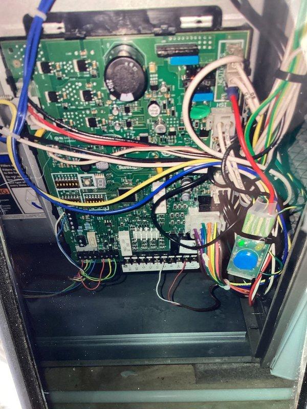 Completed MVP cooling maintenance visit on HVAC system. Performed comprehensive inspection of blower assembly and control board components. Examined squirrel cage blower with parallel fin arrangement and cylindrical drum housing, noting normal operational wear patterns. Inspected electronic control panel containing multiple stacked circuit boards with capacitors, integrated circuits, and wire harnesses. All electrical connections and components verified to be functioning within normal parameters. System operational upon completion of maintenance visit.