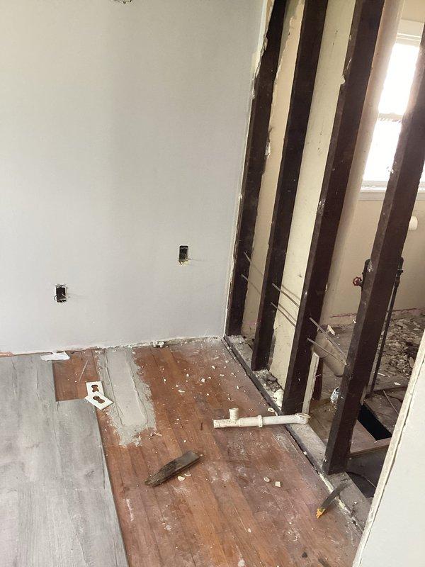 Responded to customer concern regarding recently replaced outlets and potential open neutral condition. Performed comprehensive electrical safety inspection of affected circuits during active renovation work. Tested outlet wiring connections and verified proper neutral and ground continuity throughout the circuit. Confirmed no hazardous wiring conditions present. Documented existing conditions with photos showing exposed electrical boxes in walls during construction phase. Provided technical assessment confirming electrical system safety and discussed options for any additional work needed as renovation progresses.