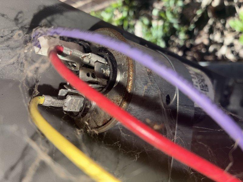 Completed promotional A/C tune-up service on residential cooling system. Connected manifold gauges to service ports to verify refrigerant pressures and system operation. Inspected and removed electrical fuses from disconnect box for examination, confirming proper amperage rating and blade condition before reinstallation. All components found operating within normal parameters upon completion of tune-up procedures.
