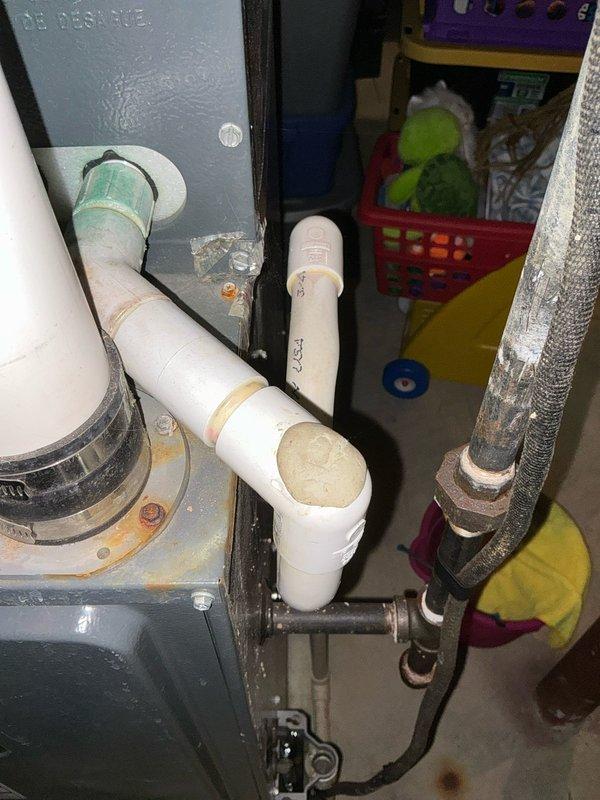 Conducted comprehensive estimate for replacement of 19-year-old furnace and air conditioning system. Assessed existing Distinctions brand furnace installation including PVC venting configuration, ductwork connections, and overall system condition. Documented current equipment setup and discussed BOGO promotional options for complete HVAC system replacement with both heating and cooling units.