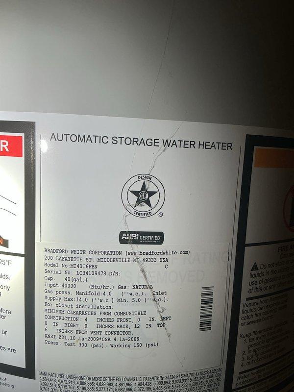 Performed complete flush and fill service on a 40-gallon Bradford White natural gas water heater (Model MI40T6FBN). Drained sediment buildup from tank, refilled system, and conducted comprehensive maintenance inspection of all plumbing connections, gas supply lines, temperature and pressure relief valve, and venting components to ensure proper operation and safety compliance.