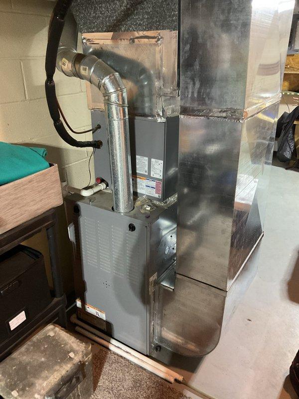 Completed annual air conditioning maintenance on a 6-year-old HVAC system. Performed comprehensive inspection of indoor furnace unit and outdoor condensing unit, checking all electrical connections, refrigerant line sets with service valves, and ductwork components. System operating within normal parameters with no deficiencies noted at time of service.