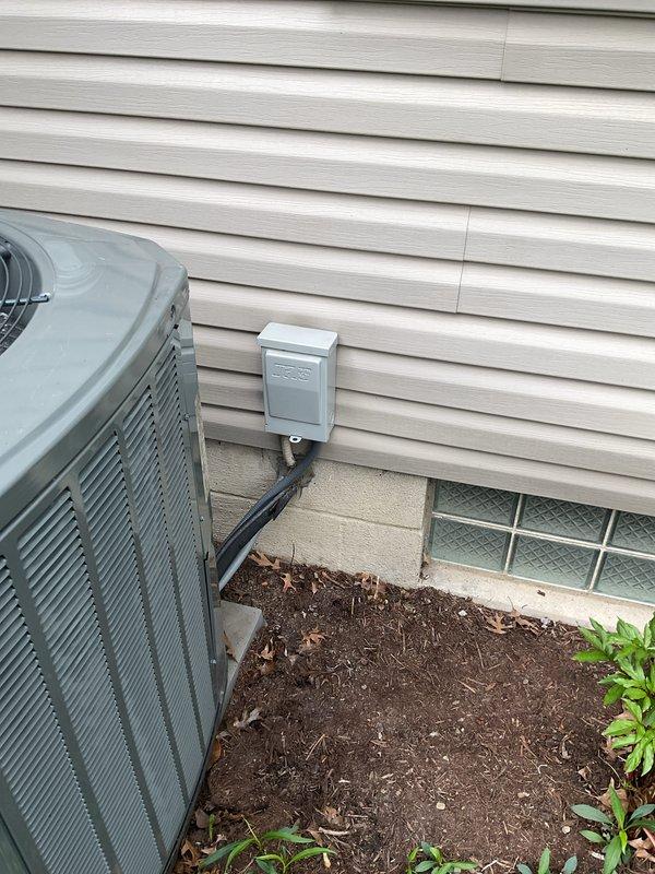 Completed preventive maintenance visit on Trane condensing unit at residential property. Performed standard cooling system inspection including visual assessment of outdoor unit condition, verified proper clearances around equipment, and documented unit operation. Unit appeared functional with normal wear consistent with outdoor installation, surrounded by adequate airflow space despite minor vegetation growth at base requiring future monitoring.
