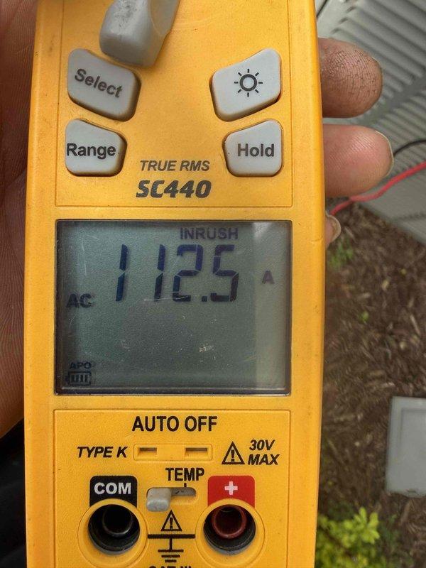 Completed MVP recurring heating maintenance visit on residential HVAC system. Performed comprehensive system inspection including visual examination of blower motor assembly, internal wiring harnesses, and electrical control boards. Measured and documented electrical readings using digital multimeter, recording 1125 AC inrush amperage to verify proper motor startup performance and confirm system is operating within manufacturer specifications.