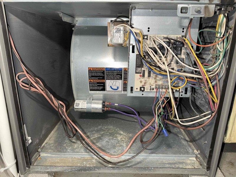Completed MVP recurring heating maintenance visit on residential HVAC system. Performed comprehensive system inspection including visual examination of blower motor assembly, internal wiring harnesses, and electrical control boards. Measured and documented electrical readings using digital multimeter, recording 1125 AC inrush amperage to verify proper motor startup performance and confirm system is operating within manufacturer specifications.